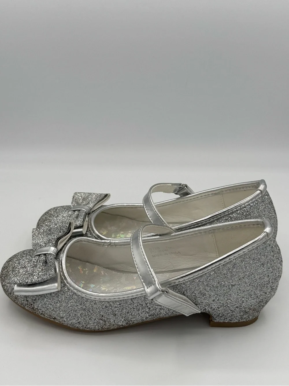 Stelle Mary Jane Silver Glitter Shoes with Prominent Bow